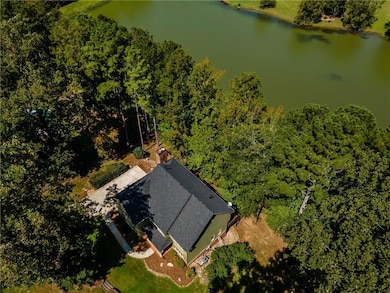 Positioned lakefront, this home blends lifestyle and luxury seamlessly.