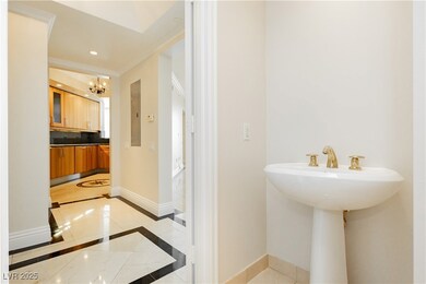 Bathroom featuring recessed lighting, baseboards,