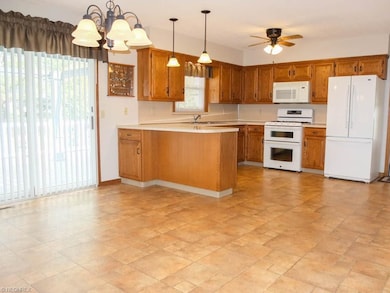 Kitchen is open to the dining room.