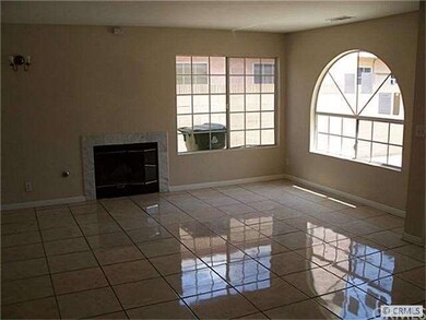 Nice large living room with fireplace.