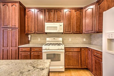 Pantry closet on left has pull-out drawers for eas