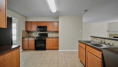 Kitchen features a brand new 5-burner gas range.