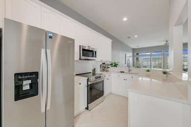 Kitchen featuring appliances with stainless steel