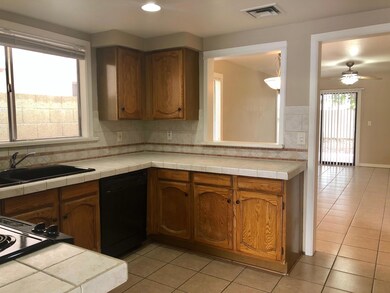 Kitchen opens to Living Area