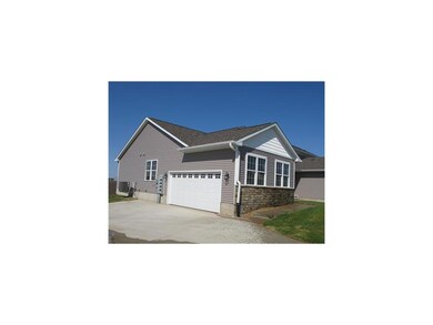 Front Exterior. end load garage