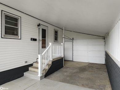 Carport with stairs to the kitchen