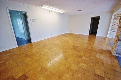 HUGE DEN WITH WOOD FLOORS