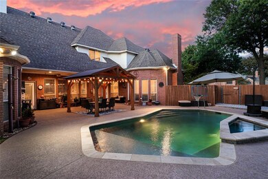 Twilight view of pool area