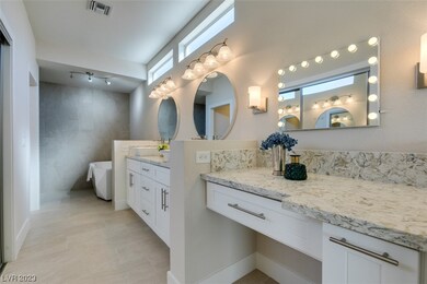 Reconfigured Primary Bath with custom makeup mirro