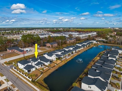 Aerial view with a residential view and a water vi