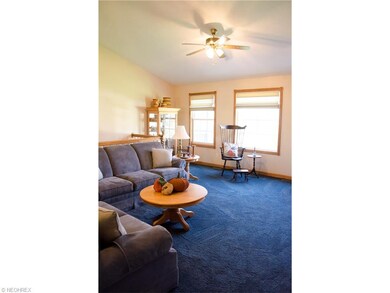 The great room also boasts a vaulted ceiling.