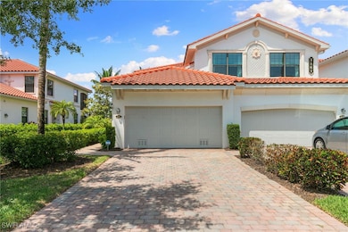 Mediterranean / spanish-style house with a garage,