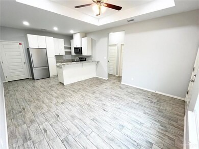 Kitchen featuring an open floor plan and great flow for spacious living!