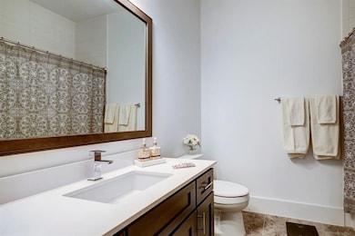 Well-appointed secondary bathroom designed perfect for everyday comfort