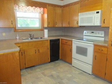 Kitchen has a pantry and great counter space.