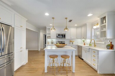 New pendant lighting over the island & farmhouse s