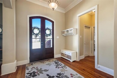 Oversized foyer with a beautiful double door entry
