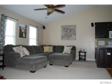Living room with view from the hallway.