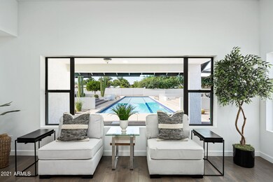 Great Room looks out on resort backyard