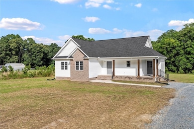 View of front of house with a shingled roof, a fro