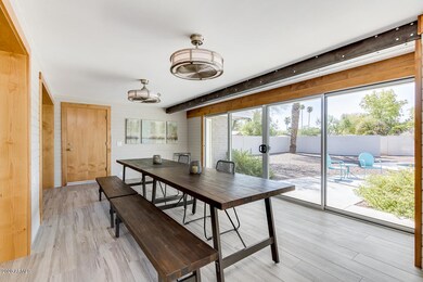 Sunroom with windows to back yard