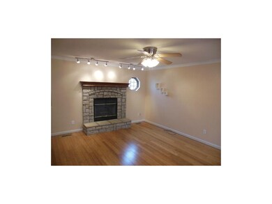 Great Rm Fireplace with Beautiful Floors and Updat