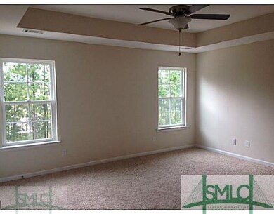 MASTER BEDROOM OVERLOOKS WOODED PRIVATE YARD