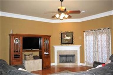 French doors lead from the greatroom to the backya
