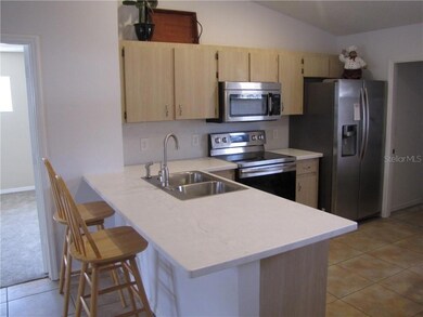 New Quartz Counters, Updated Appliances, Eat in Bar and Still room for Kitchen Table