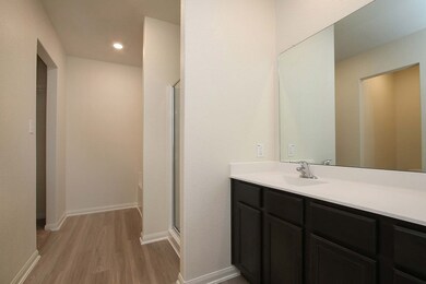 Even the bathrooms in this home are spacious and upgraded.
