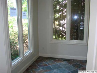 The sunroom/office is just to the left of the livi