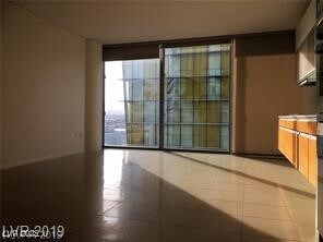 Unfurnished room featuring tile patterned flooring