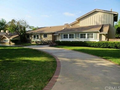 Gated Walnut Acres Estate with Large Circular Drive
