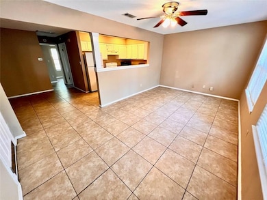 Unfurnished living room with light tile patterned