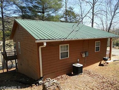 Exterior Back. Exterior Back of Home from Left Side