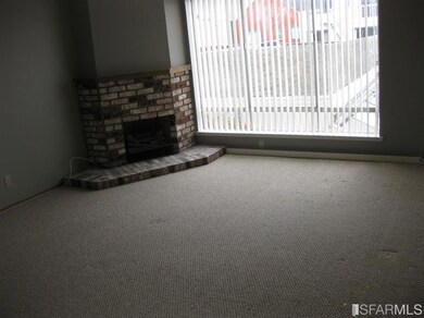 Living area of 2bd unit before it was rented out.
