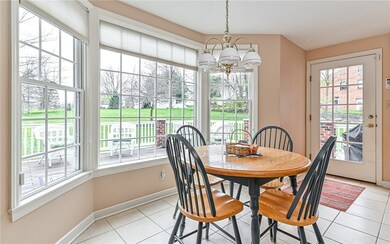 Sun drenched breakfast nook with door that leads t
