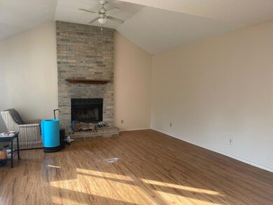Unfurnished living room with a ceiling fan, lofte