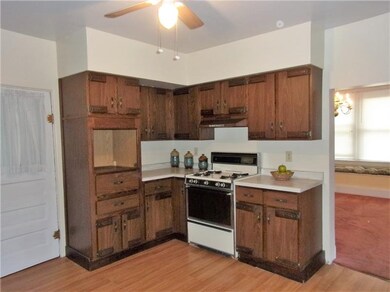Kitchen: Includes a Maytag gas stove and features 