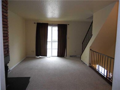 Living Room. The sliding glass doors open to a lar