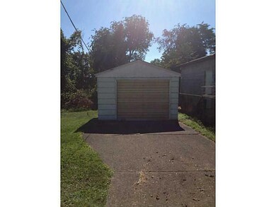 Parking Lot/Garage. One car detached garage and dr