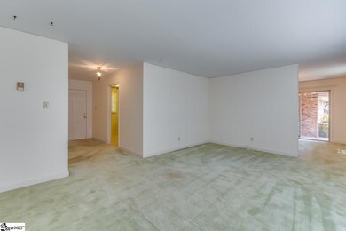 Shows a part of the kitchen, front hall and DR. Yo