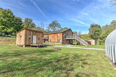 In addition to the home, there are several outbuil