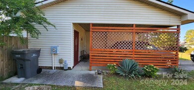 Side view of the home facing the covered carport