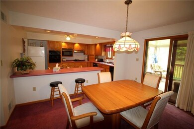 Another view of dining room.  Sliding door leads t