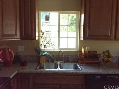 View #2 of kitchen showing the new windows and gra