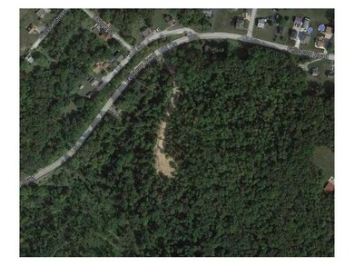 Other. Overhead Google shot shows driveway cut int