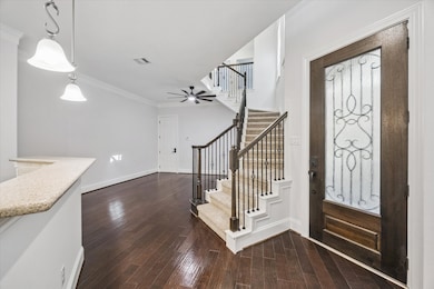 The first floor has a pleasing open layout with the dining area on the south side.