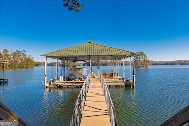 32'x32' with 40ft walkway. Extra-thick steel for wave protection. Boat lift.