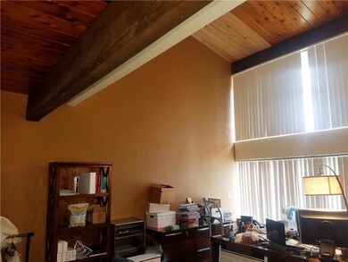 Imagine this room cleared out with shades open--it